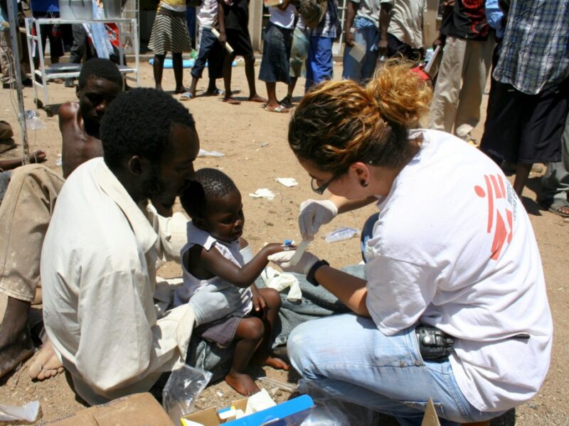 Doctor working in the field