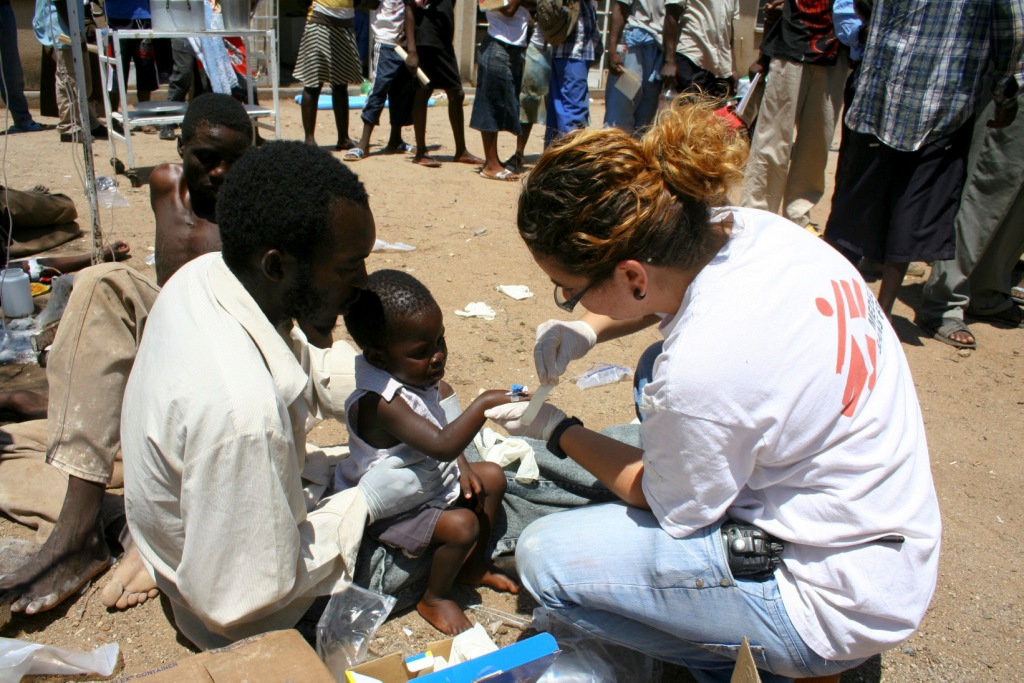 Doctor working in the field