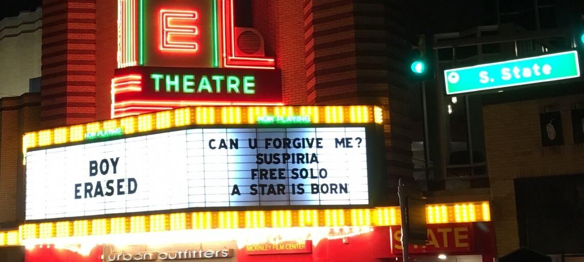 photo of a cinema frontage where text is part of the building and might convey important information.